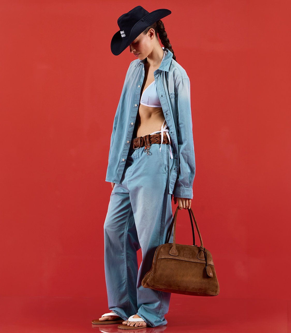 Golden Hour summer jewellery collection — gold fish charm, pearl ring, chain & blue glass pendant styled on an orange slice — Shop Summer