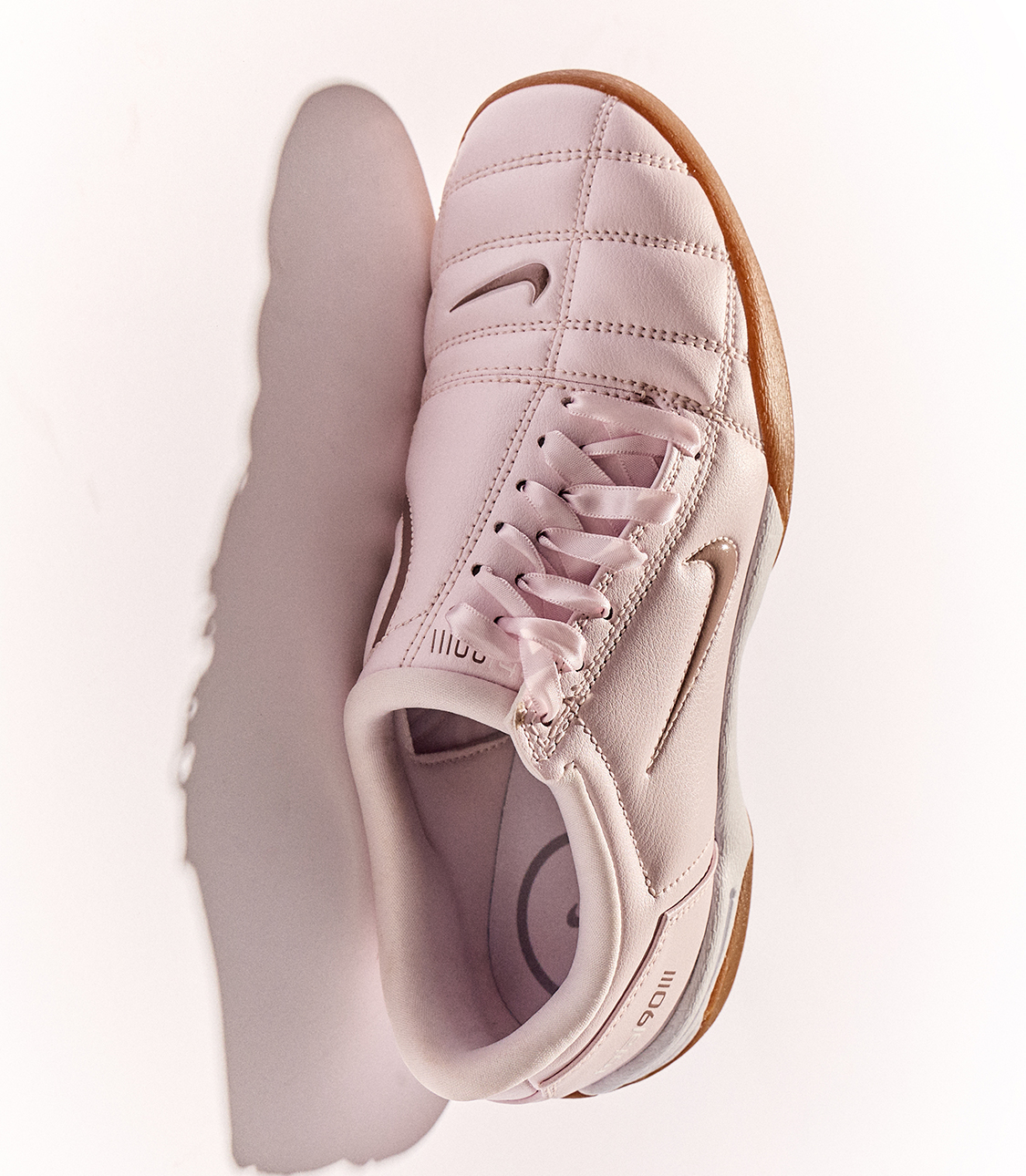 Nike Moon Racer OG sneakers in cream and crimson red Swoosh on red background — Shop New Releases