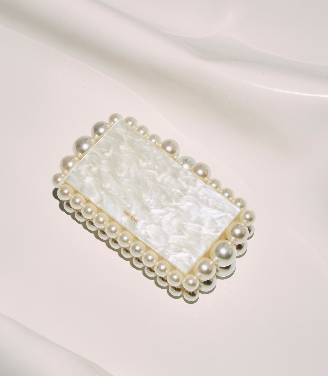 Level Shoes — Cool clutches campaign