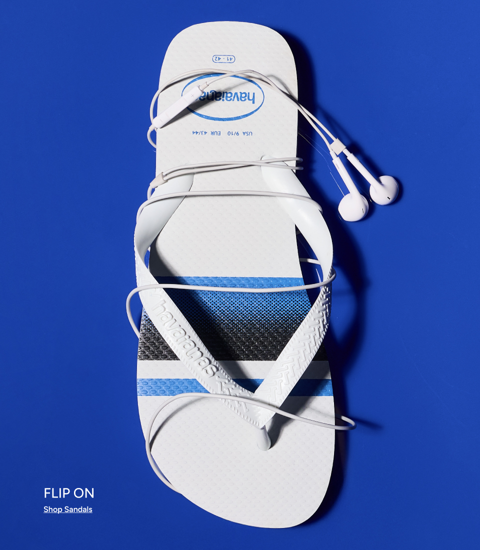 Havaianas white flip-flop with earbuds wrapped around it on a bold blue background — Flip On, Shop Sandals